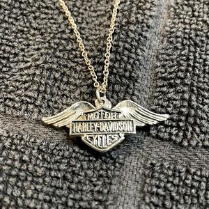 Costume motorcycle necklace with two charms